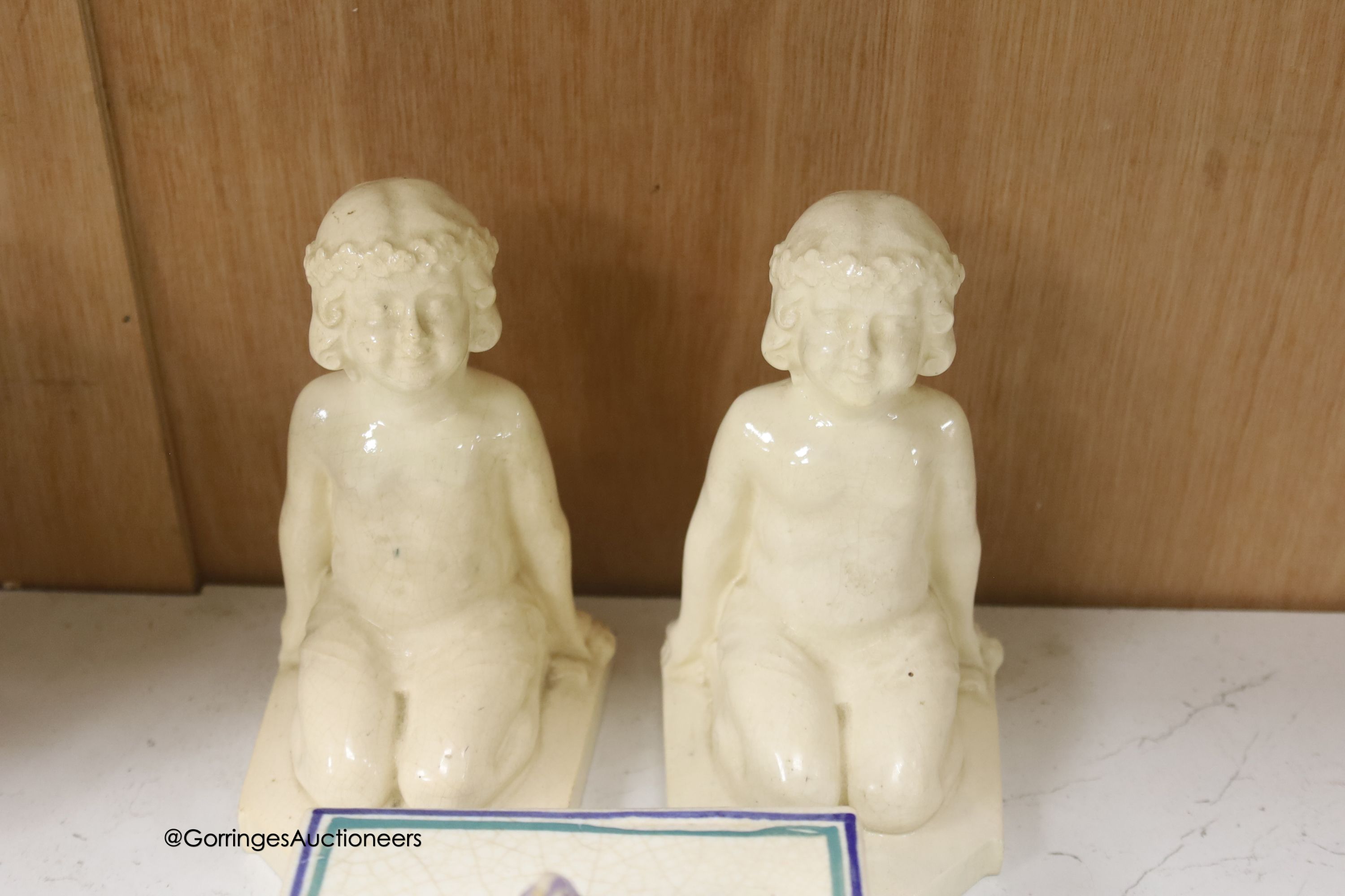A Carter, Stabler & Adams Poole square serving dish, with cover, width 13cm, a pair of white glazed earthenware nude bookends, a Limoges teaset and three other items